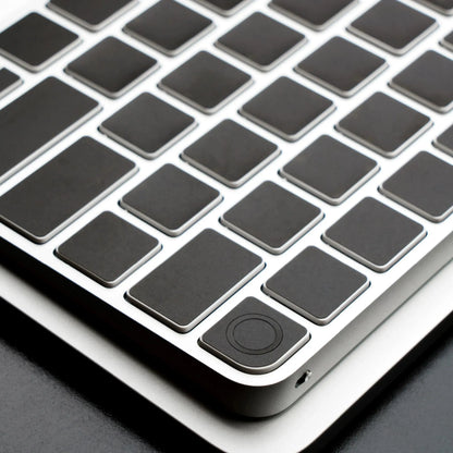 MacBook keyboard skin installation step — Barekey