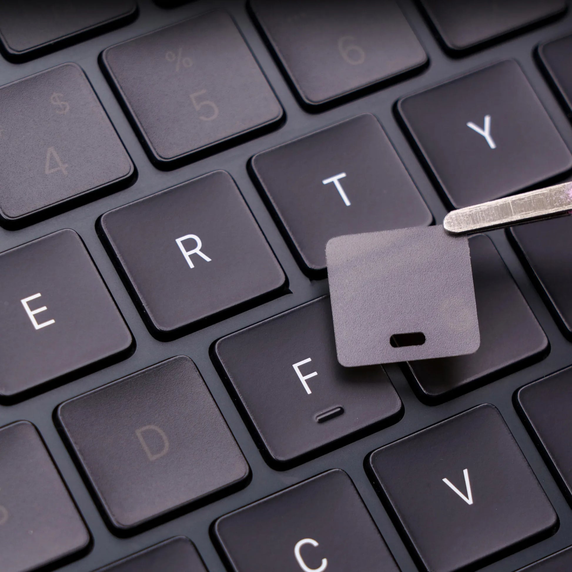 MacBook keyboard skin lifestyle shot premium desk — Barekey